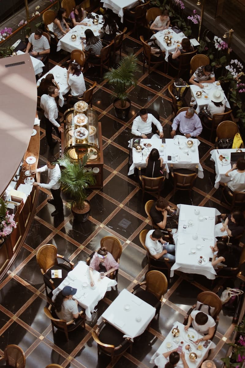 Warm restaurant interior with table settings